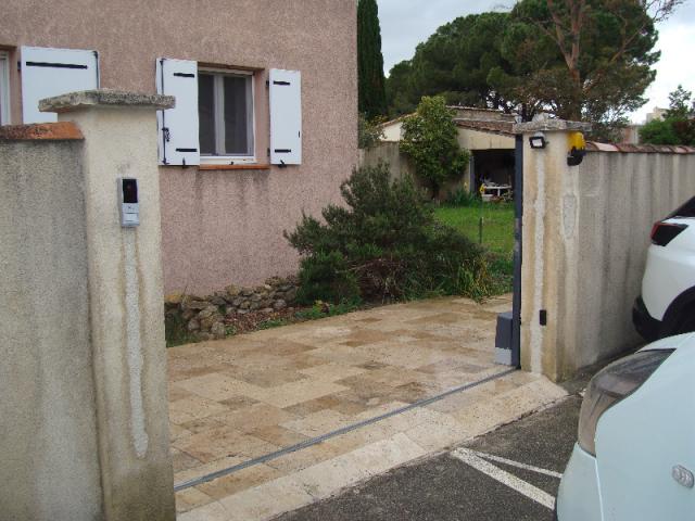 installation d'un portail électrique coulissant et pose de visiophone